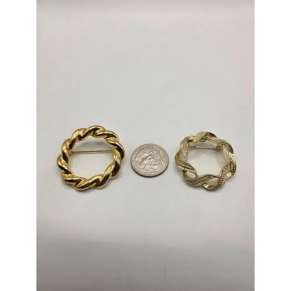 1743. Set of Two Gold Tone Circle Brooch / Pins